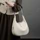 2025 spring and summer new niche design cowhide underarm bag, shoulder and handbag, genuine leather crescent bucket bag for women
