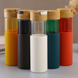 Creative bamboo lid, double-wall high-silicon boron glass, outdoor handle, portable, straight cup, silicone sleeve, gift cup, wholesale.