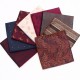 Manufacturer of men's business suit pocket squares, patterned wedding handkerchiefs, and small square handkerchiefs for banquets and suit accessories.