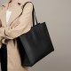 New niche women's genuine leather large-capacity briefcase, laptop bag, black cowhide commuter bag.