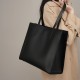 New niche women's genuine leather large-capacity briefcase, laptop bag, black cowhide commuter bag.