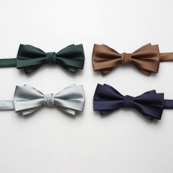 Solid-color men's polyester bow ties in stock, including multi-colored wedding groom and groomsmen bow ties and tie ties.