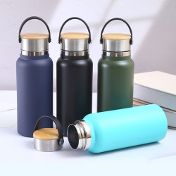 New hot-selling 32oz space bottle with handle and bamboo lid, stainless steel thermos, double-walled vacuum sports bottle, wholesale
