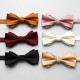 Solid-color men's polyester bow ties in stock, including multi-colored wedding groom and groomsmen bow ties and tie ties.