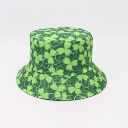 A versatile bucket hat with Irish trefoil print, a stylish, reversible sun protection hat for women.