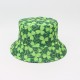 A versatile bucket hat with Irish trefoil print, a stylish, reversible sun protection hat for women.
