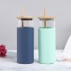 Creative new high-borosilicate single-walled glass mugs, stylish men's and women's bamboo lids, straw mugs with silicone sleeves, wholesale