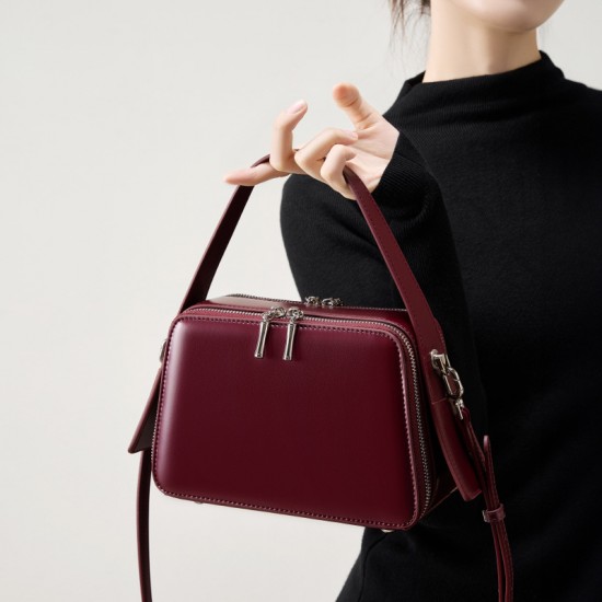 Spring/Summer 25 new niche design ear-hook series Handbag, eaves bag, genuine leather women's commuter crossbody bag