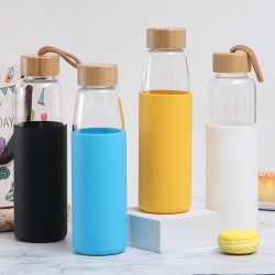 New single-wall glass, bamboo lid with handle, outdoor portable, silicone sleeve, glass water bottle, wholesale.