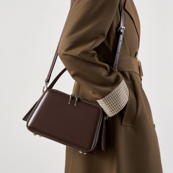 Spring/Summer 25 new niche design ear-hook series Handbag, eaves bag, genuine leather women's commuter crossbody bag