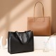 New niche women's genuine leather large-capacity briefcase, laptop bag, black cowhide commuter bag.